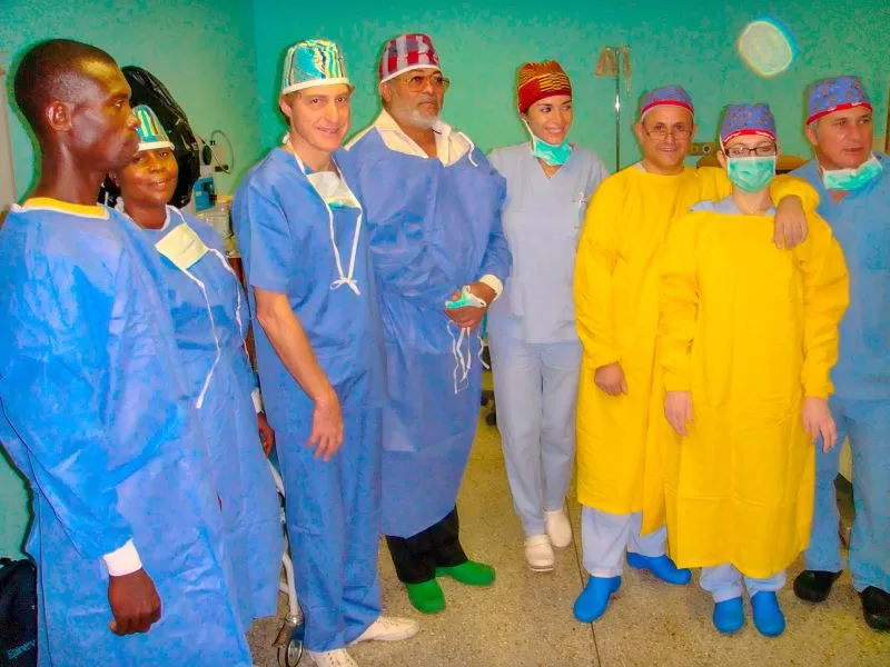 The former President with Italian doctors at the Comboni hospital in 2010