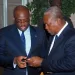 Stan Dogbe (L) interacts with former President John Mahama