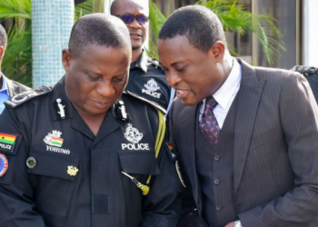 Inspector-General of Police, Mr. Christian Tetteh Yohuno, (left), in a tete-a-tete with Special Prosecutor, Mr. Kissi Agyebeng