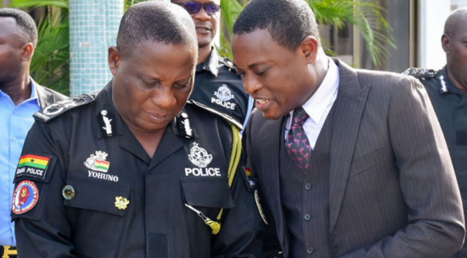 Inspector-General of Police, Mr. Christian Tetteh Yohuno, (left), in a tete-a-tete with Special Prosecutor, Mr. Kissi Agyebeng
